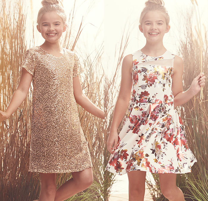 younf ladies wearing Laundry's dress. Flower background